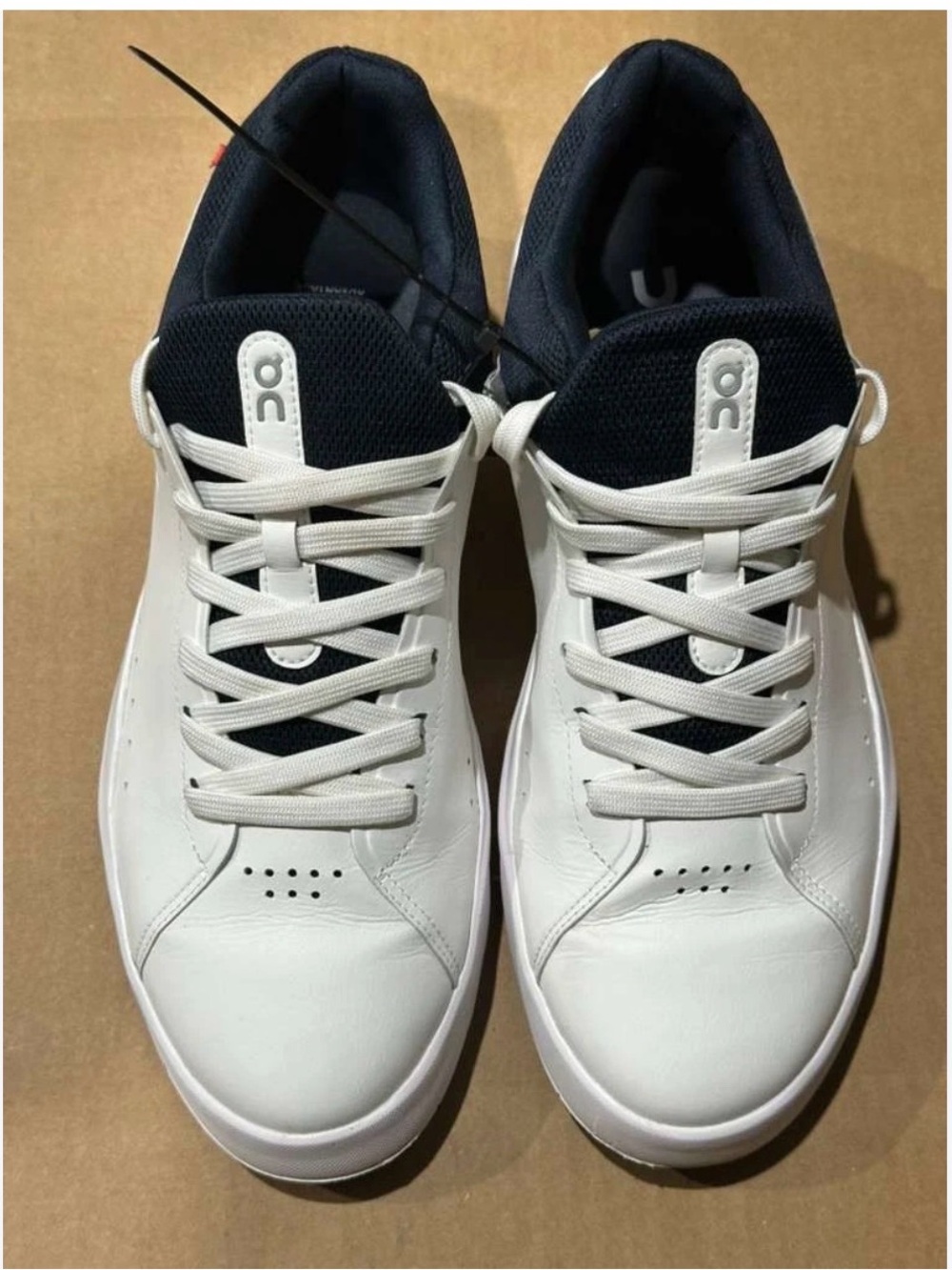 On Running Men’s White and Navy Low-Top Sneakers
